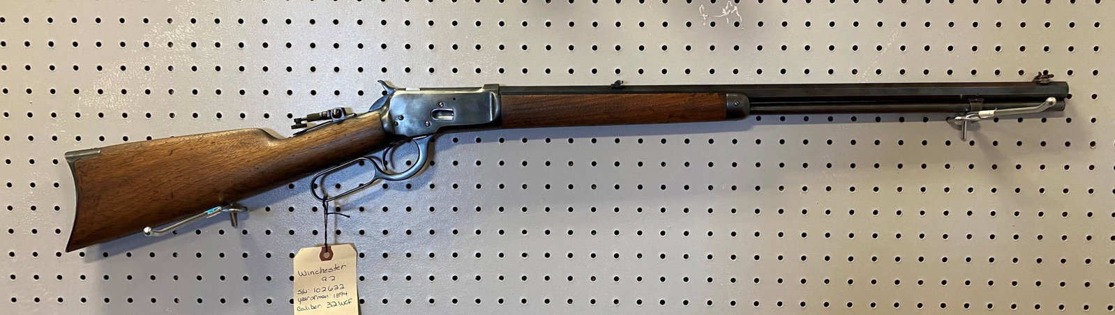 Winchester 1892 .32 WCF Caliber Octagon Barrel Rifle: 20" Barrel w/ Pop Up Front & Rear Sites Great Condition --------SPECIAL NOTE------ THE CODY FIRARMS MUSEUM HAS THIS RIFLE AND SERIAL NUMBER MATCHING TO A 44 CAL ROUND BARREL. IT APPEARS THE BARREL WAS