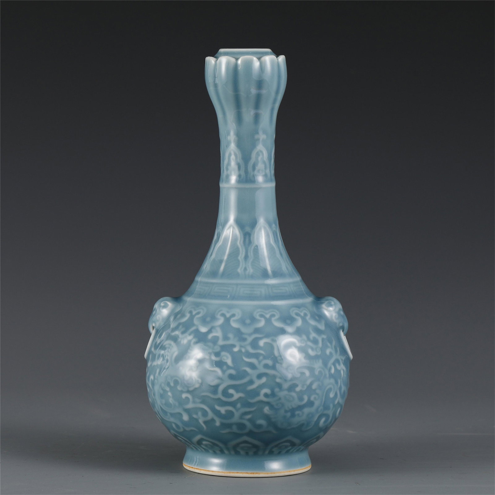 A CHINESE CELADON GLAZE BEAST PATTERN BEAST EAR VASE: H. 24 cm. Diam. 10.7 cm. Weight 930 gram.