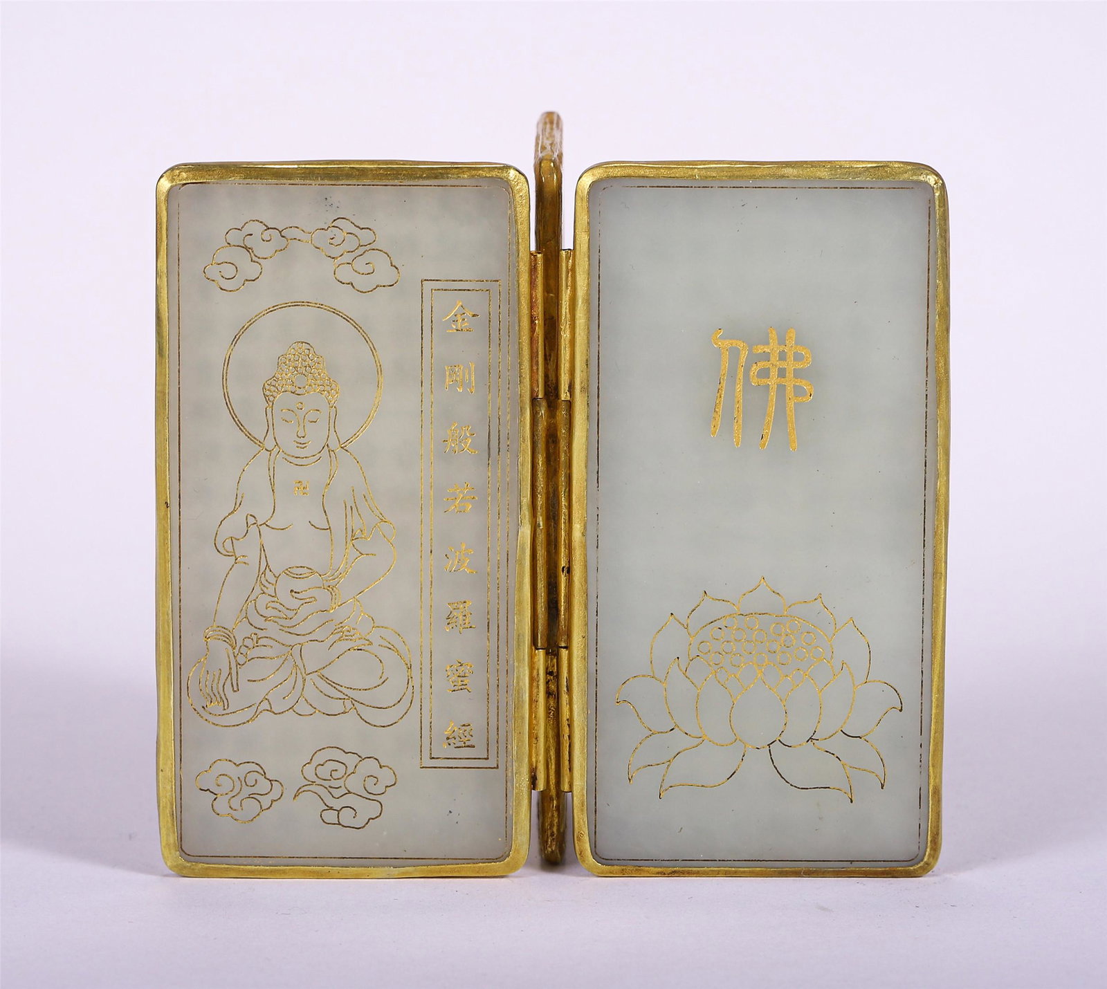 CHINESE GILT HETIAN JADE ENGRAVED BUDDHIST SUTRA: L. 5.5 cm. T. 1 cm. H. 9.6 cm. Weight 170 gram.