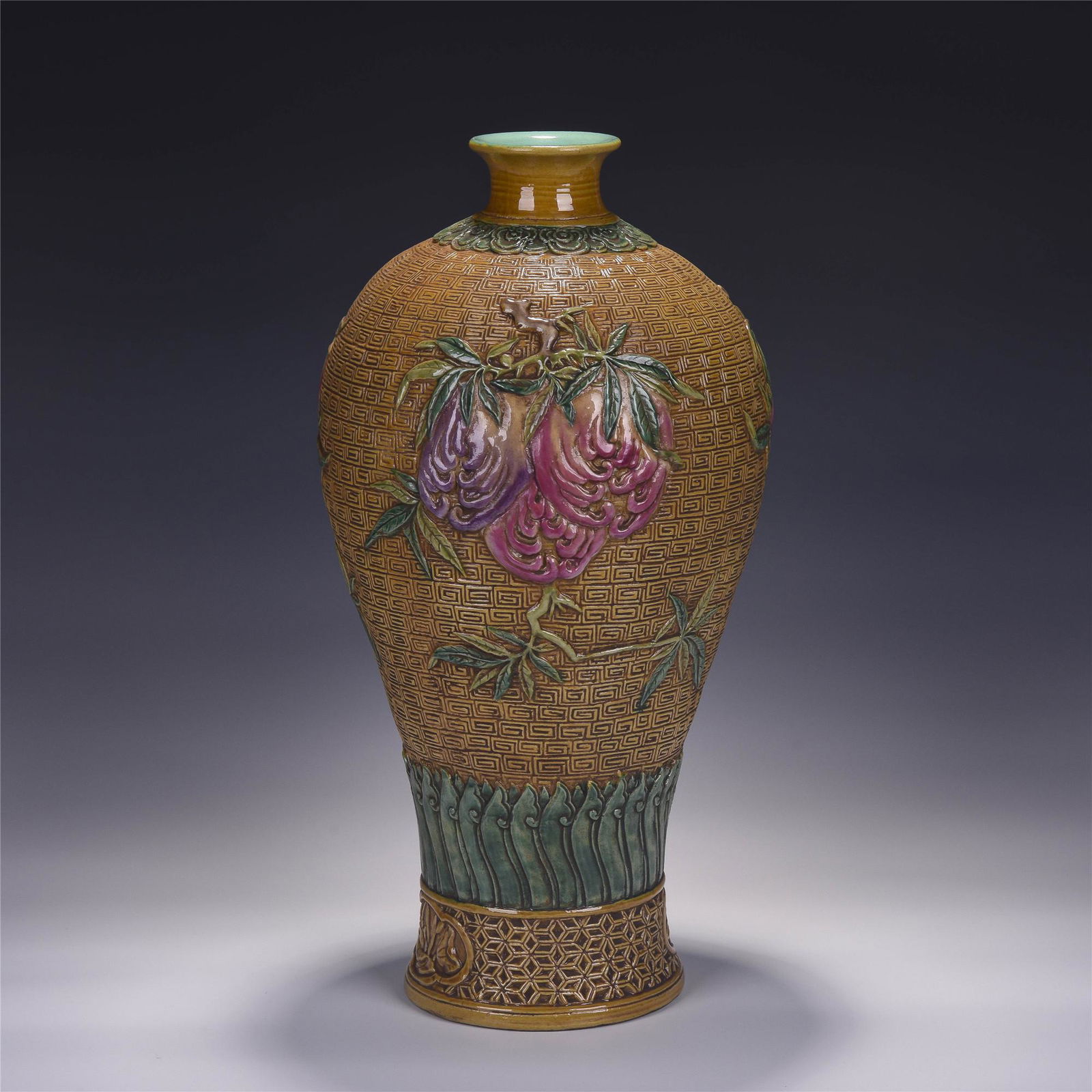 CHINESE YELLOW GROUND FAMILLE ROSE ENGRAVED PATTERNS: H. 38 cm. W. 20 cm.