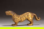 A CHINESE BRONZE-GILT BEAST