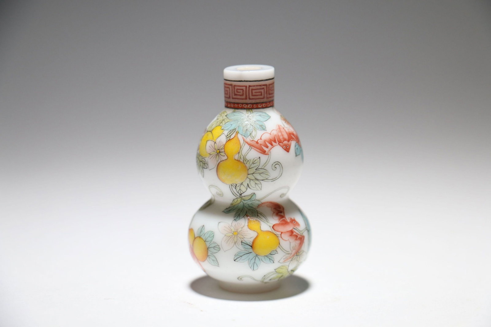 A Chinese Colored Glass Snuff Bottle: A Chinese Colored Glass Snuff Bottle. Ht. 5.3cm