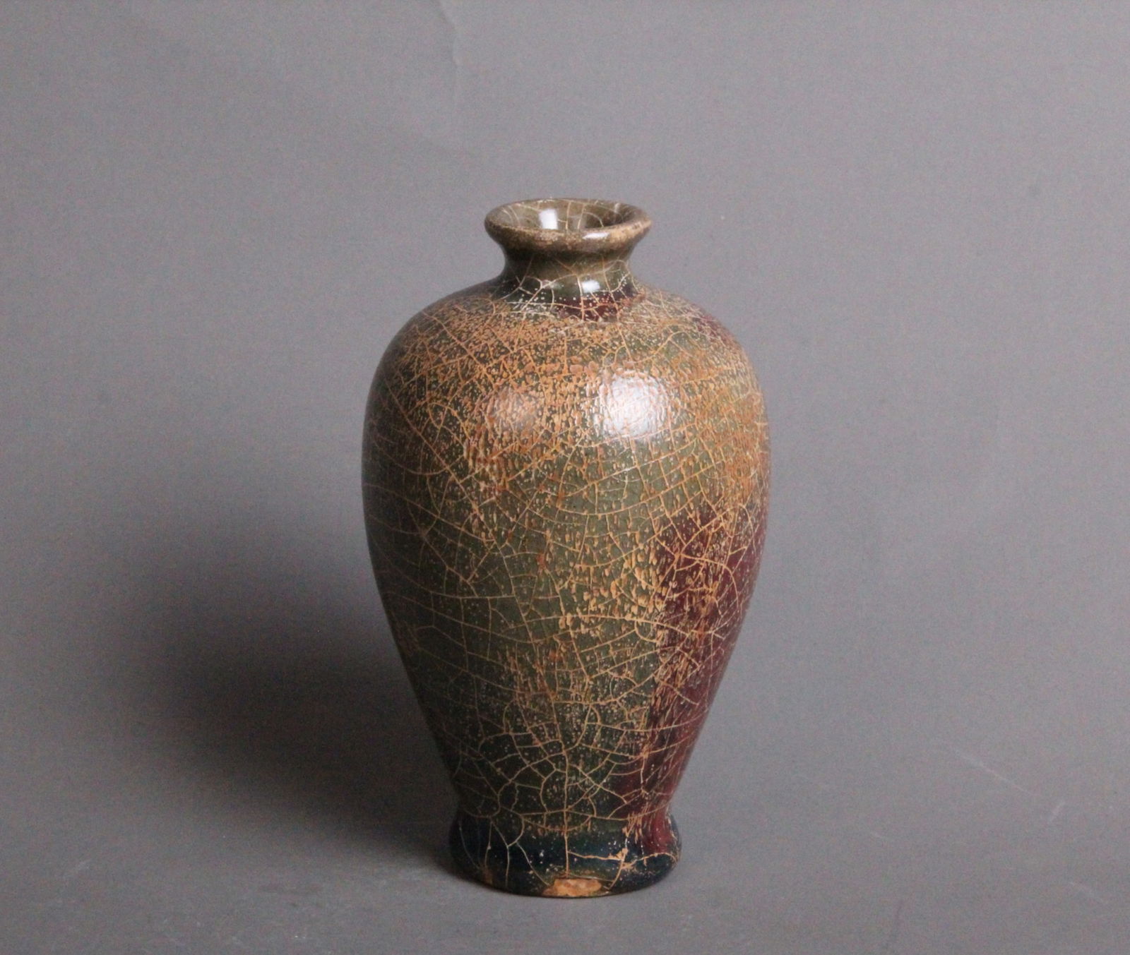 A Chinese Brown Glazed Porcelain Vase: A Chinese Brown Glazed Porcelain Vase. Ht. 12cm, Wd. 7cm