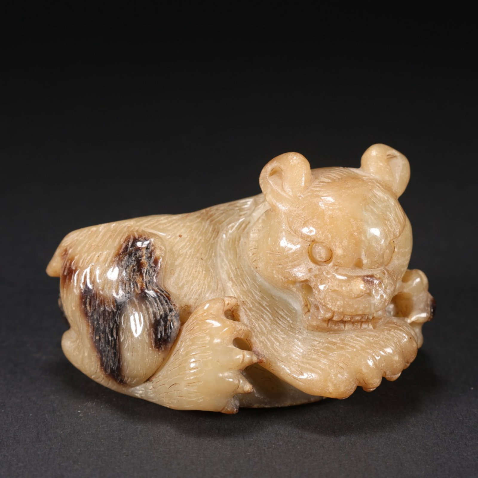 A Chinese Carved Jade Bear Statuette: A Chinese Carved Jade Bear Statuette. Lg. 7cm, Wd. 4.8cm, Ht. 4.2cm, Wt. 152g