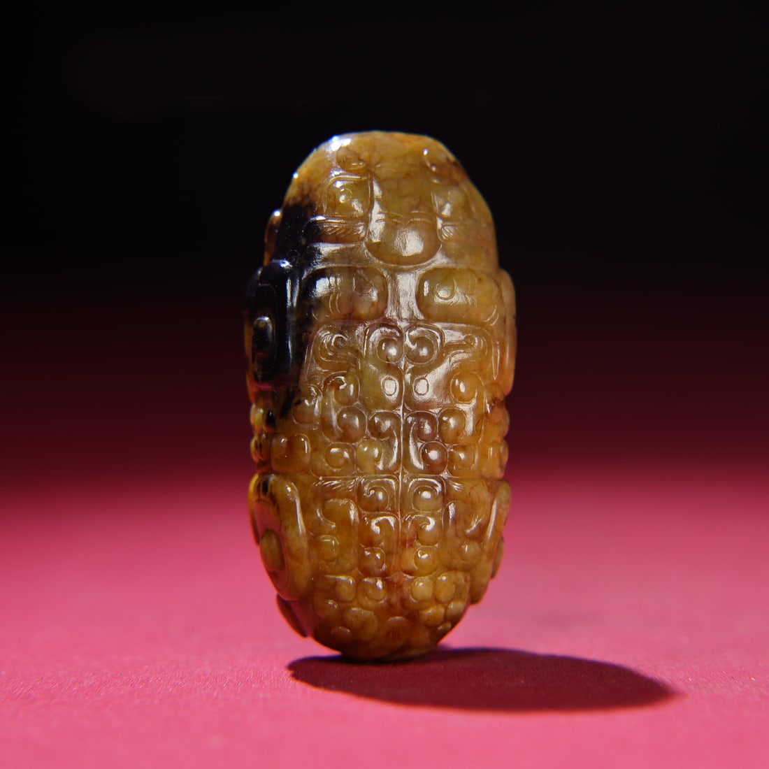 A Chinese Carved Jade Foo-Dog Statuette: A Chinese Carved Jade Foo-Dog Statuette. Ht. 6.2cm, Wd. 3.1cm, Th. 0.2cm, Wt. 87g