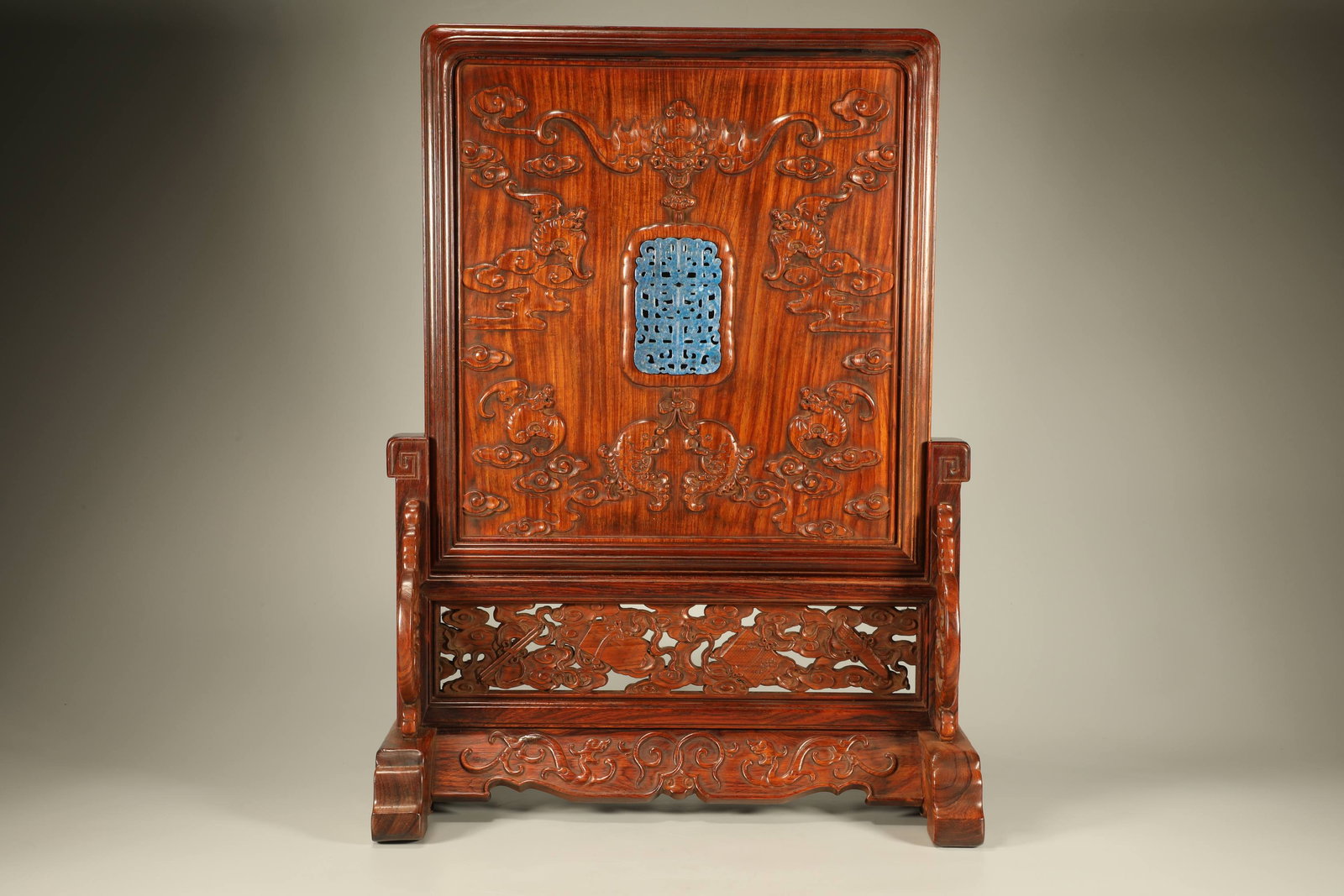 A Chinese Carved Hardwood Table Screen with Carved Lapis Lazuli Inlaid: A Chinese Carved Hardwood Table Screen with Carved Lapis Lazuli Inlaid. Ht. 46cm, Diam. 34cm, Wd. 17cm