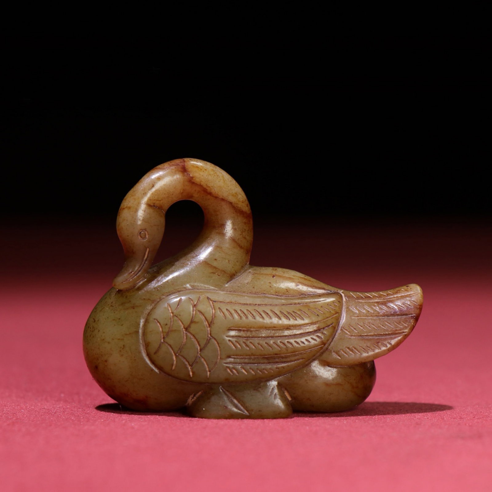 A Chinese Carved Jade Goose Statuette: A Chinese Carved Jade Goose Statuette. Lg. 5.7cm, Wd. 2.3cm, Th. 4.3cm, Wt. 66g