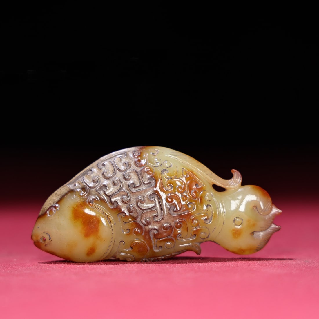 A Chinese Carved Jade Fish Statuette: A Chinese Carved Jade Fish Statuette. Lg. 8cm, Wd. 3.6cm, Th. 1.9cm, Wt. 64g