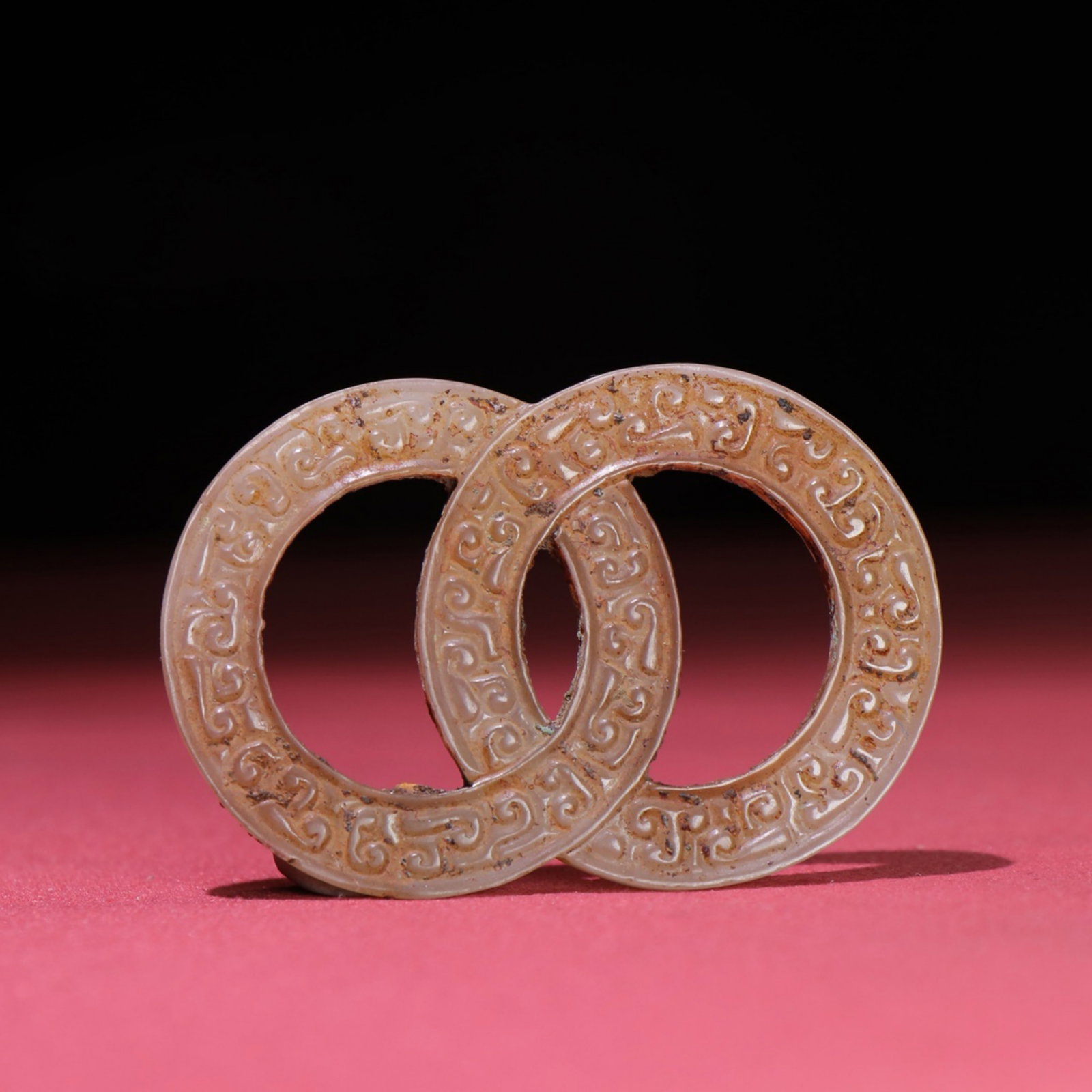 A Chinese Carved Jade Double-Ring Pendant: A Chinese Carved Jade Double-Ring Pendant. Lg. 6.6cm, Wd. 4.4cm, Th. 0.4cm, Wt. 23g