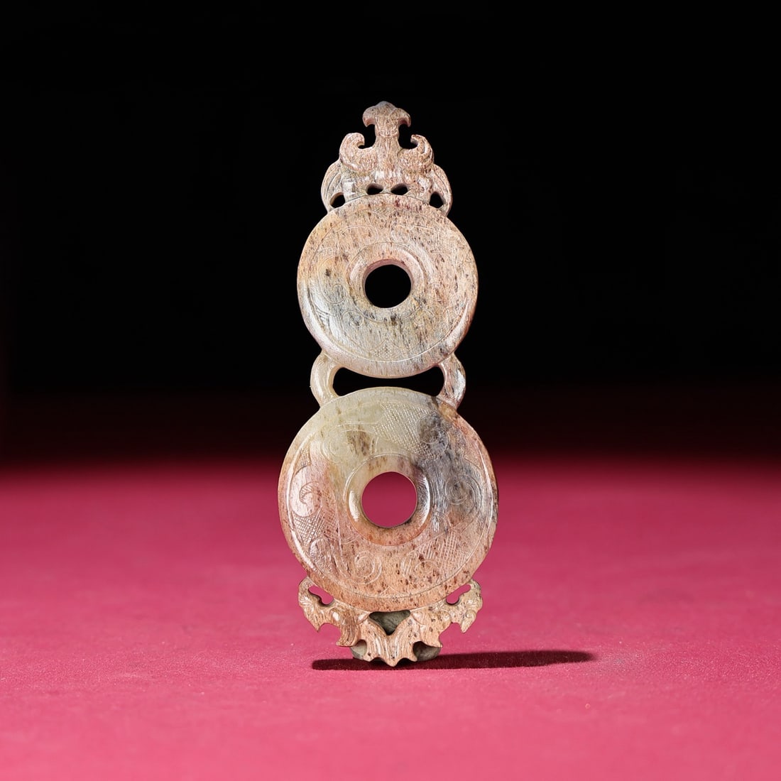 A Chinese Carved Jade Double-Ring Pendant: A Chinese Carved Jade Double-Ring Pendant. Ht. 9.9cm, Wd. 3.9cm, Th. 0.9cm, Wt. 59g