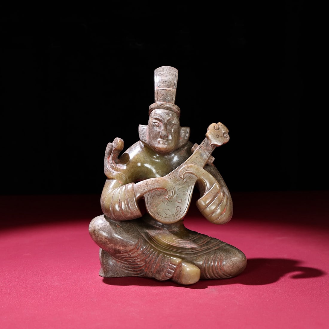 A Chinese Carved Jade Figure of Musician: A Chinese Carved Jade Figure of Musician. Ht. 22.3cm, Wd. 15cm, Th. 8.5cm, Wt. 1976g