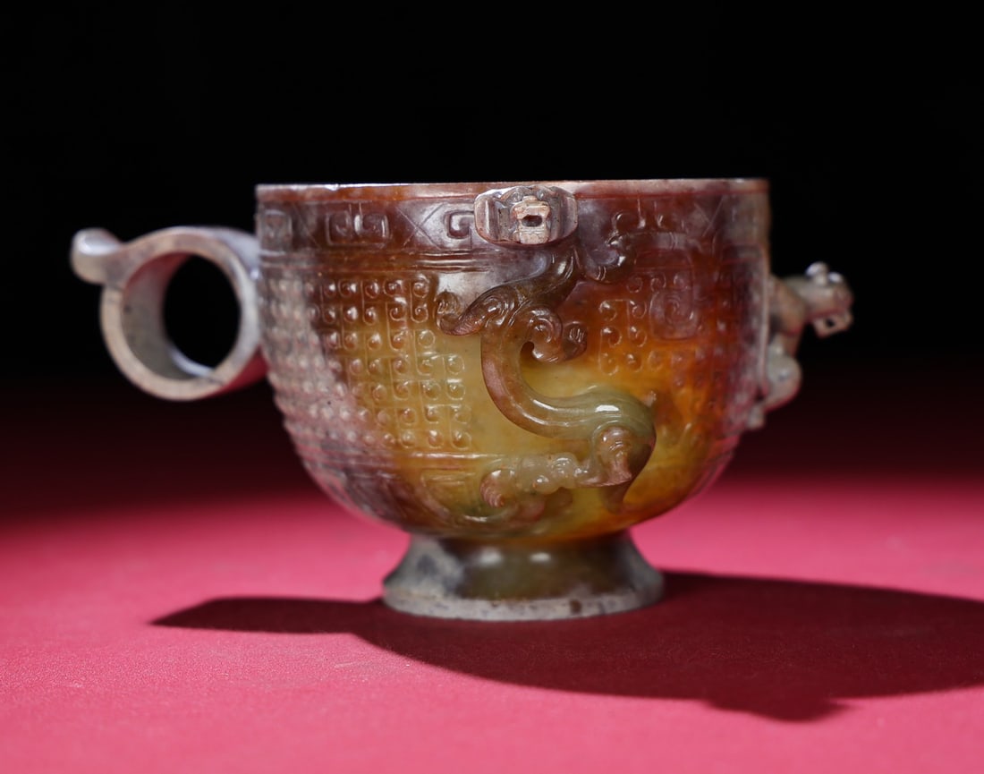 A Chinese Carved Jade Dragon Cup: A Chinese Carved Jade Dragon Cup. Ht. 8cm, Wd. 11.7cm, Lg. 14.7cm, Wt. 288g