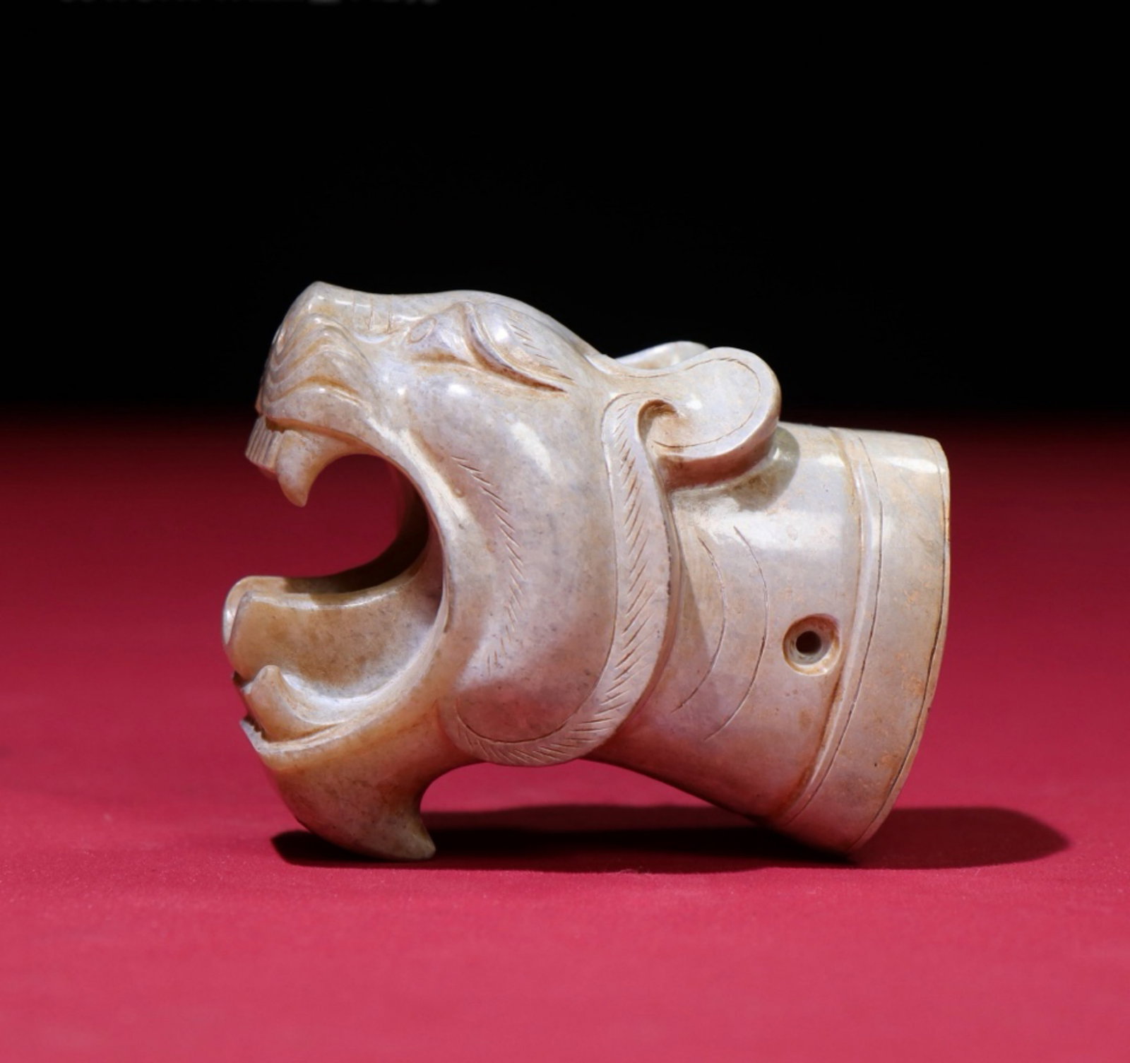 A Chinese Carved Jade Tiger Head Pendant: A Chinese Carved Jade Tiger Head Pendant. Lg. 6cm, Wd. 5.1cm, Th. 4.1cm, Wt. 142g
