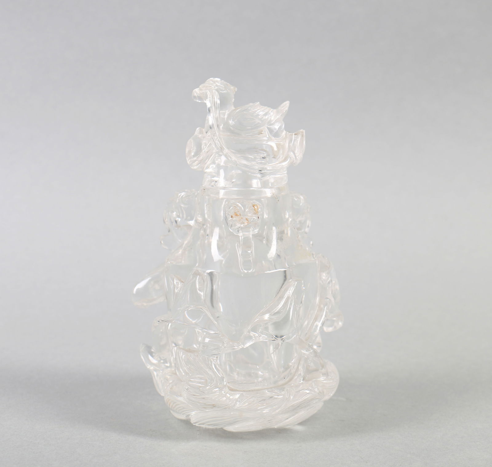 A Carved Crystal Vase with Lid: A Carved Crystal Vase with Lid. Overall Max Ht. 14.5cm, Wt. 715g
