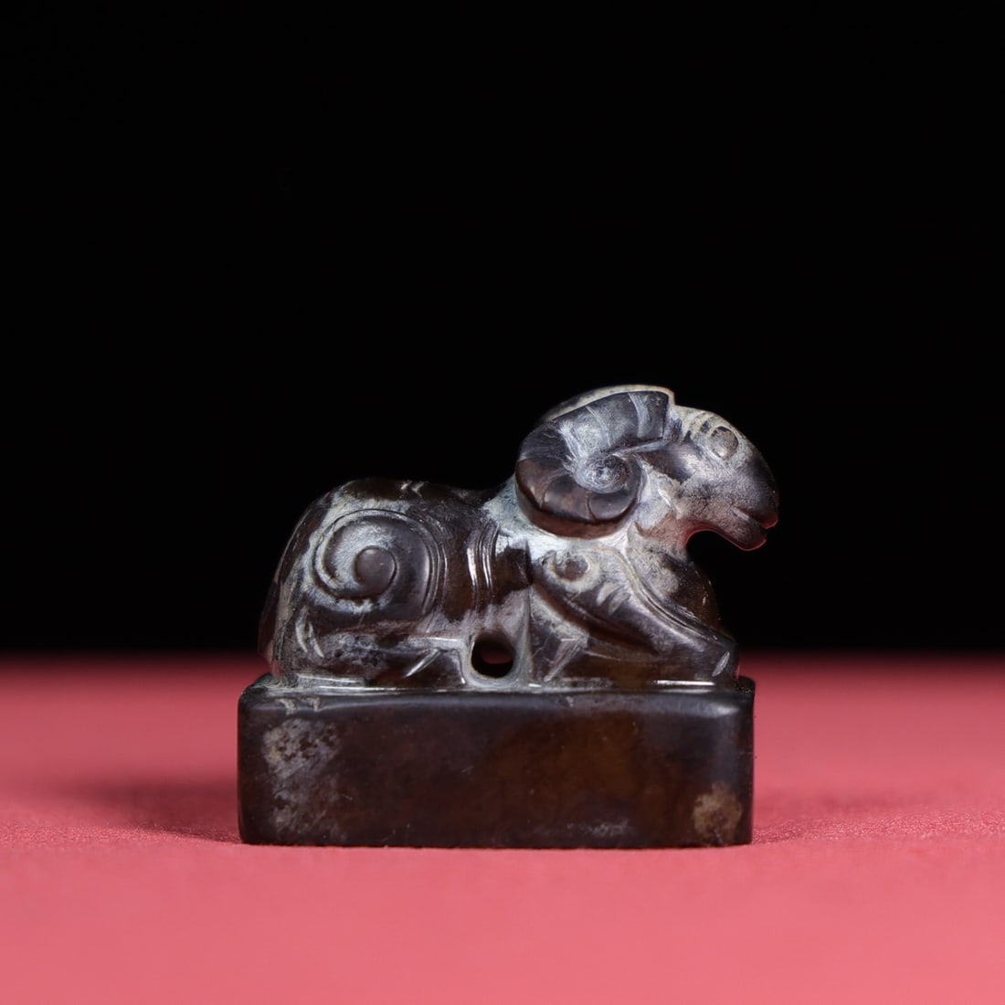 A Chinese Carved Jade Goat Seal: A Chinese Carved Jade Goat Seal. Lg. 3.3cm, Wd. 2.2cm, Th. 2.8cm, Wt. 37g