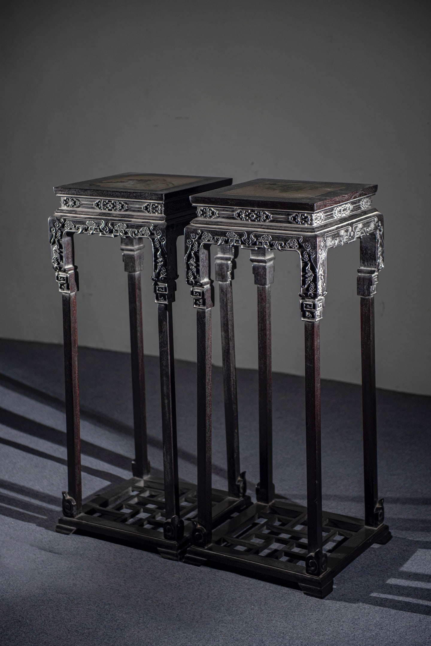 A Pair of Chinese Carved Hardwood Stands with Marble Inlaid: A Pair of Chinese Carved Hardwood Stands with Marble Inlaid. Lg. 38cm, Wd. 38cm, Ht. 106cm
