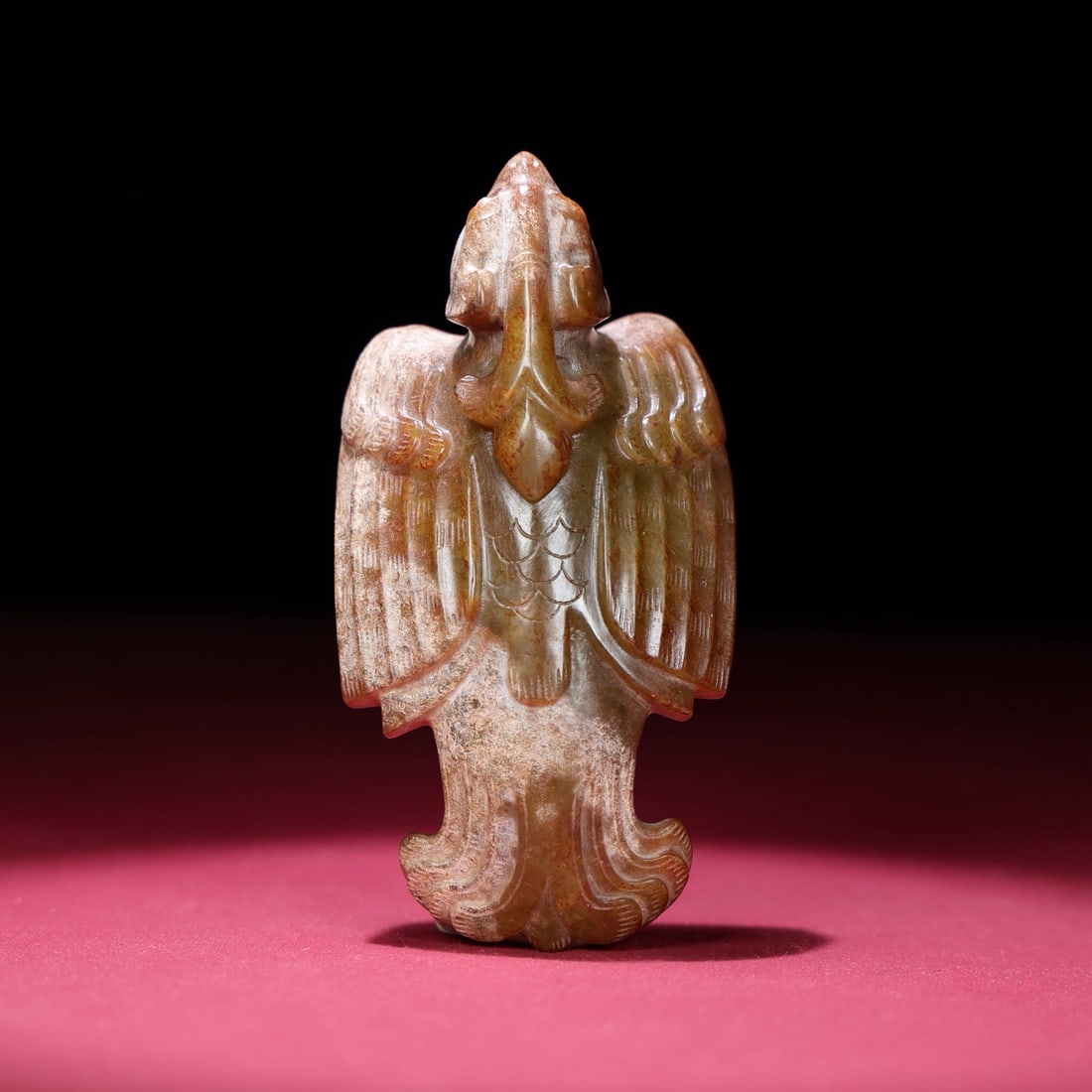 A Chinese Carved Jade Phenix Statuette: A Chinese Carved Jade Phenix Statuette. Ht. 8.6cm, Wd. 4.3cm, Th. 2.5cm, Wt. 89g