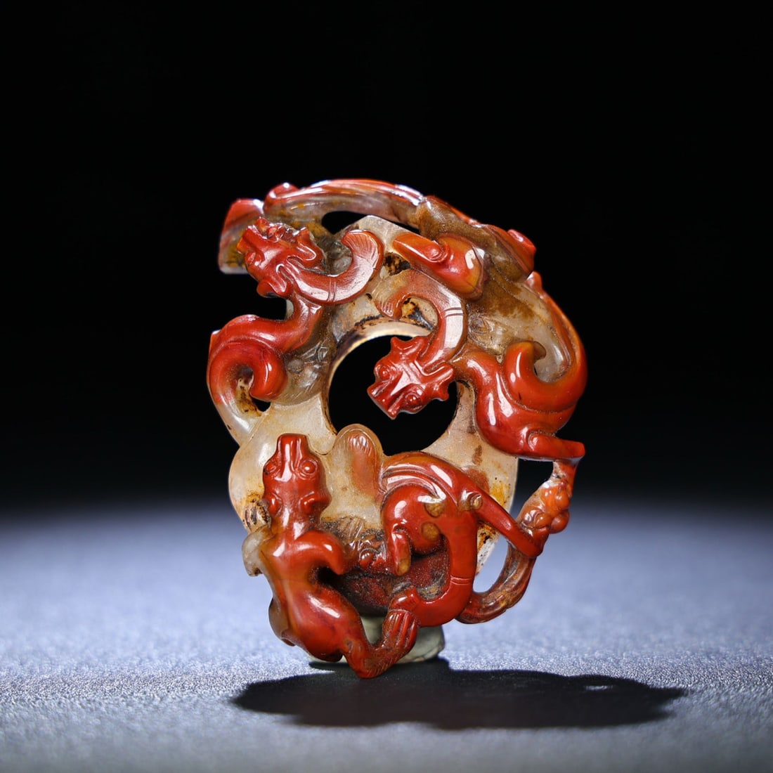 A Chinese Carved Red Jade Dragon Pendant (1 of 9)
