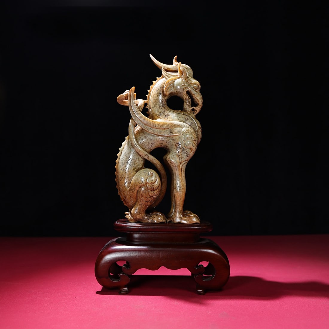 A Chinese Carved Jade Dragon Statuette: A Chinese Carved Jade Dragon Statuette. Ht. 24cm, Wd. 6.9cm, Th. 11.7cm, Wt. 1411g