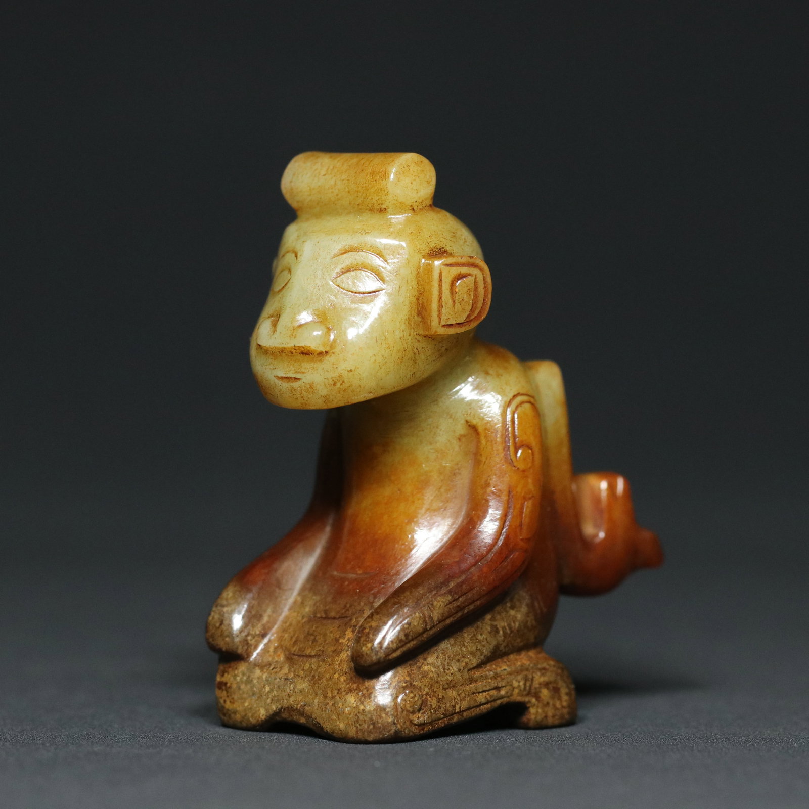 A Chinese Carved Jade Figure of Kneeling Man (1 of 9)