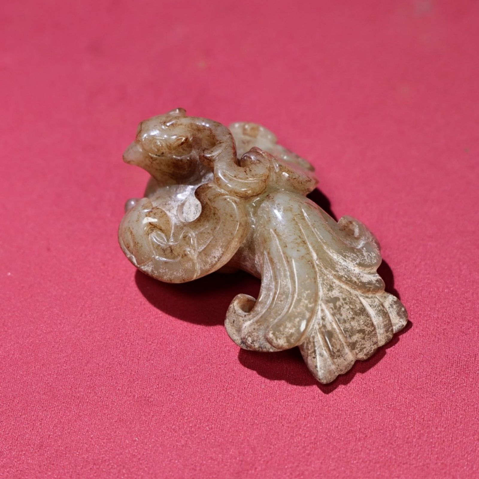 A Chinese Carved Jade Phoenix Pendant: A Chinese Carved Jade Phoenix Pendant. Lg. 7cm, Wd. 5cm, Th. 3.1cm, Wt. 101g