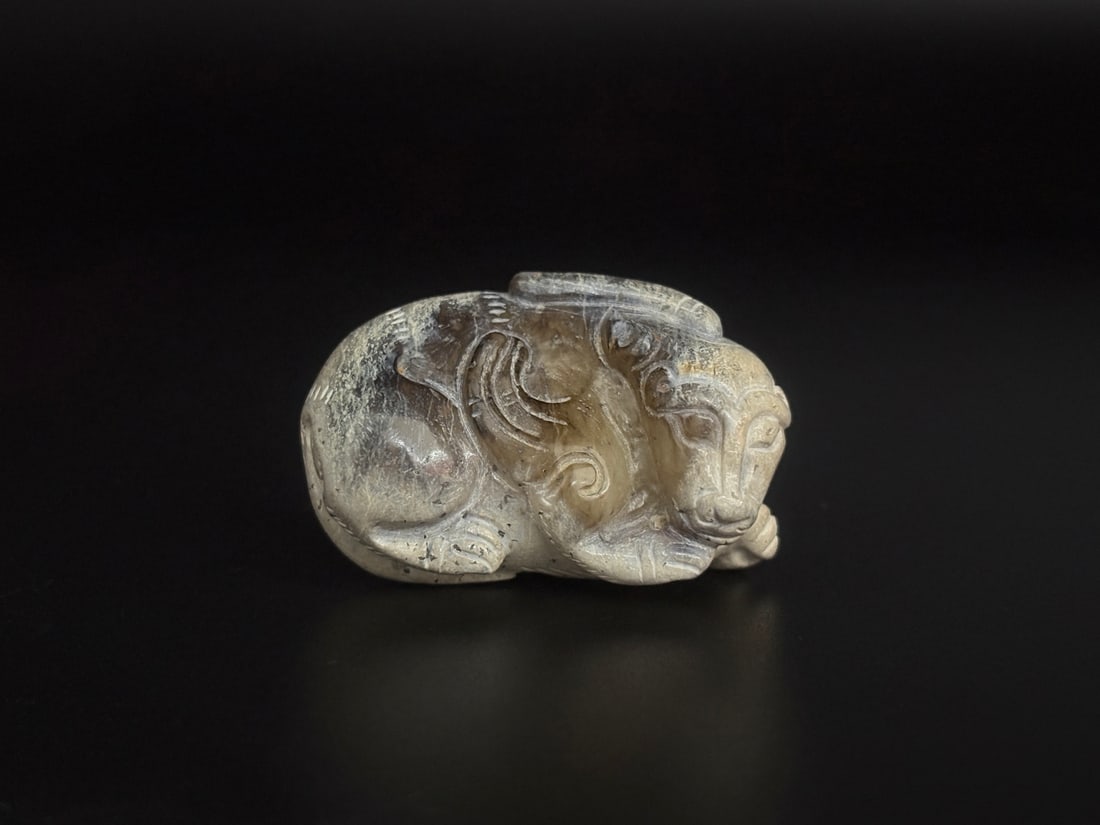 A Chinese Carved Jade Foo-Dog Statuette (1 of 9)