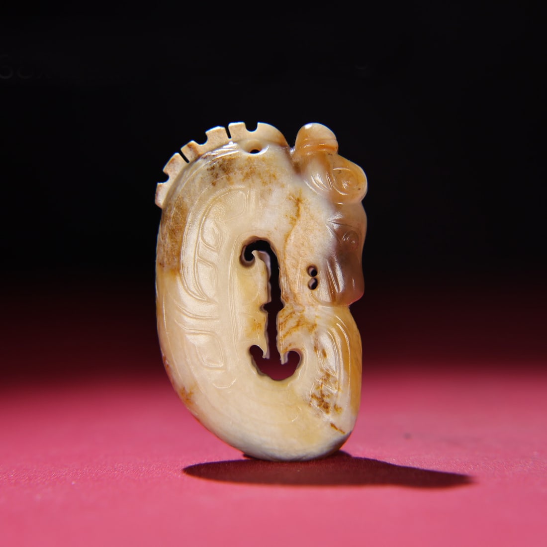 A Chinese Carved Jade Dragon Pendant: A Chinese Carved Jade Dragon Pendant. Ht. 6.2cm, Wd. 3.8cm, Th. 1.5cm, Wt. 68g