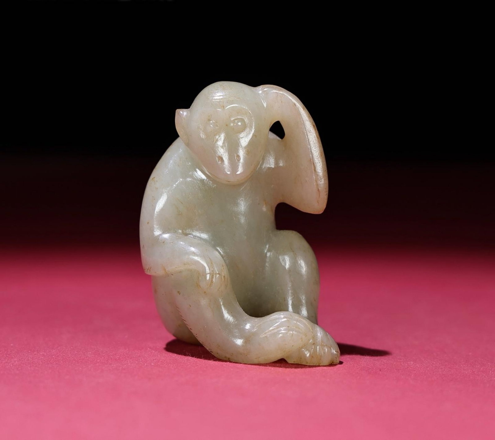 A Chinese Carved Jade Monkey Statuette (1 of 9)