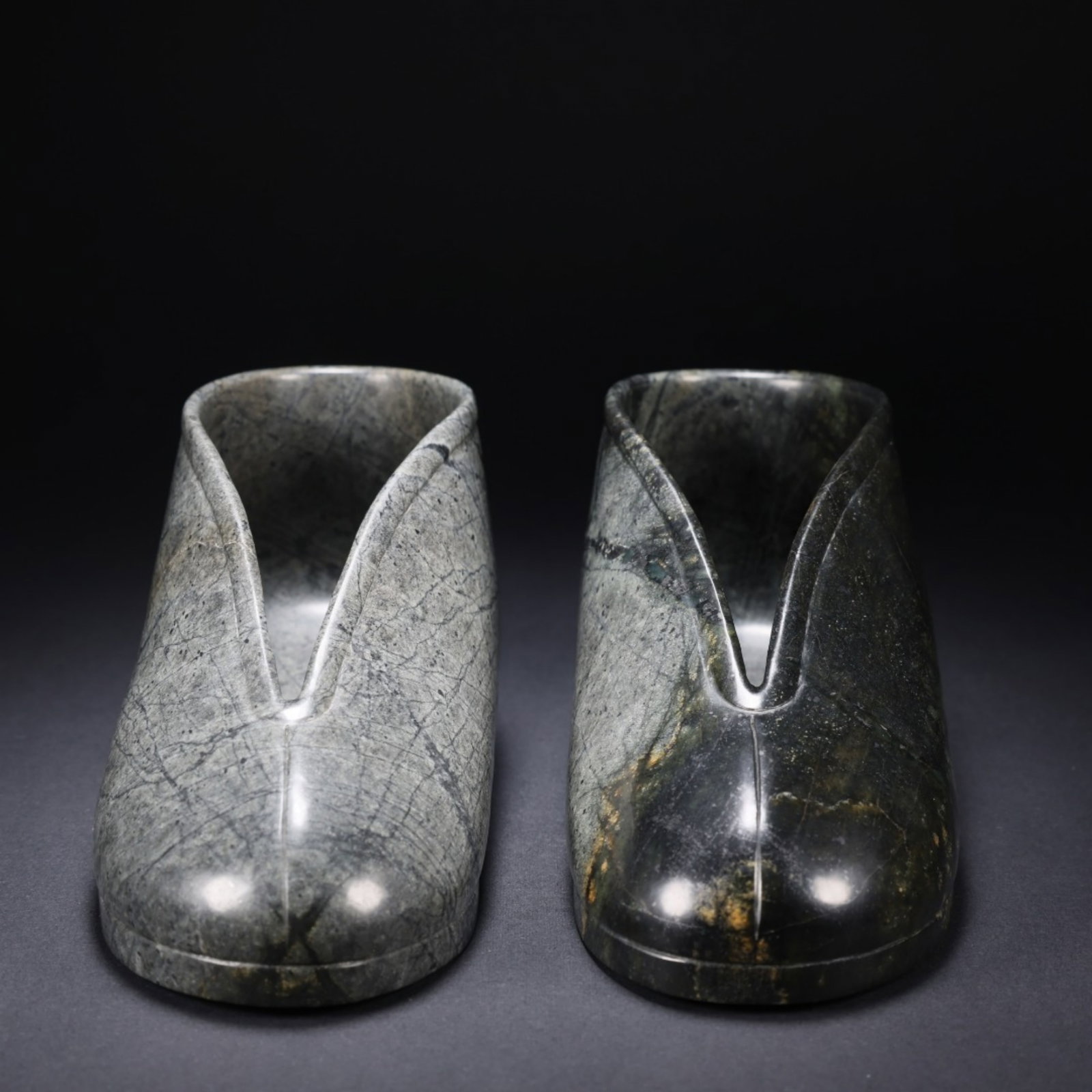 A Pair of Chinese Carved Jade Shoes Decoration: A Pair of Chinese Carved Jade Shoes Decoration. Lg. 17cm, Wd. 6cm, Ht. 7.4cm, Wt. 923g