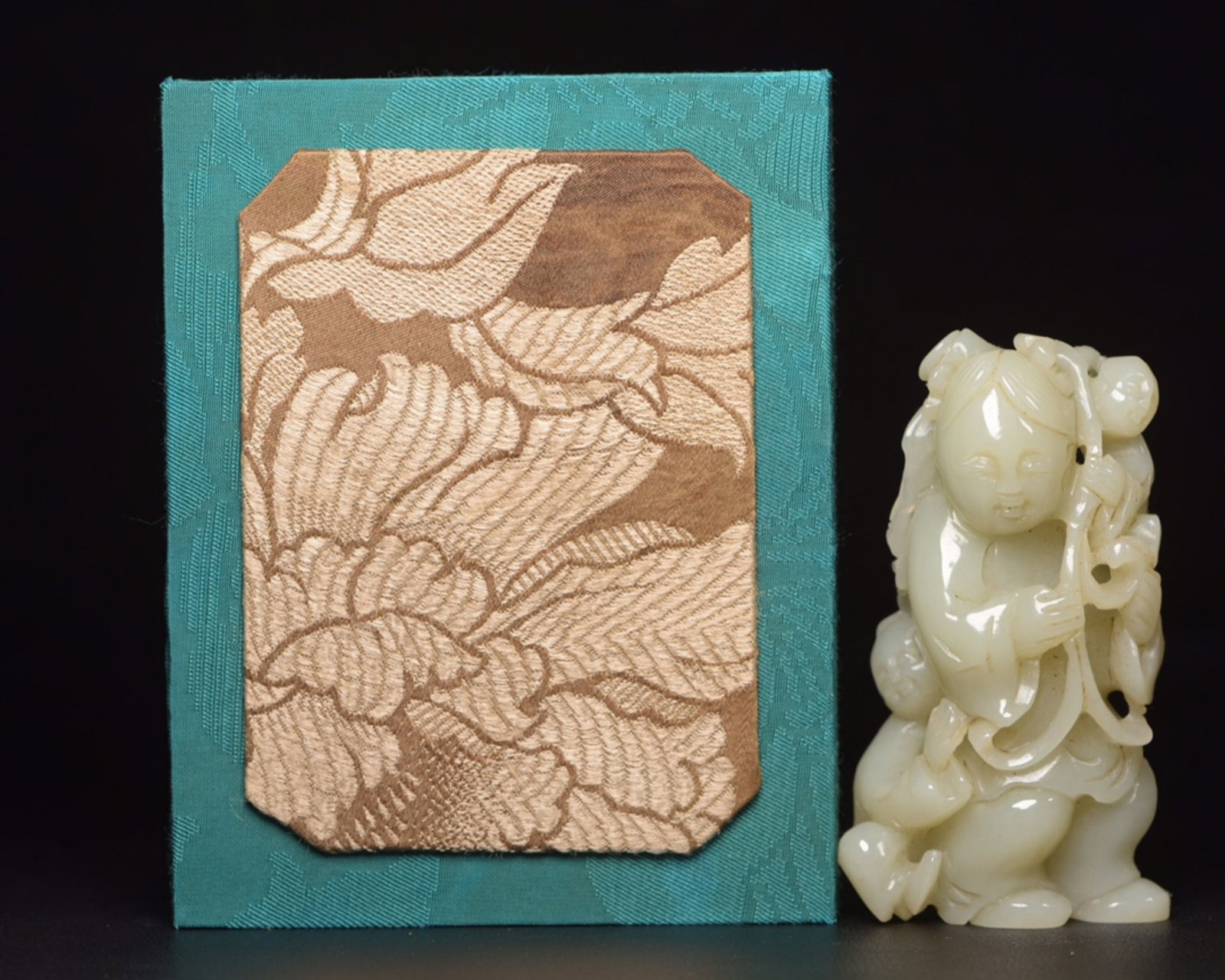 A Chinese Carved Jade Figure of Boy: A Chinese Carved Jade Figure of Boy. Ht. 9.6cm, Wd. 5.5cm, Th. 3.0cm, Wt. 208g