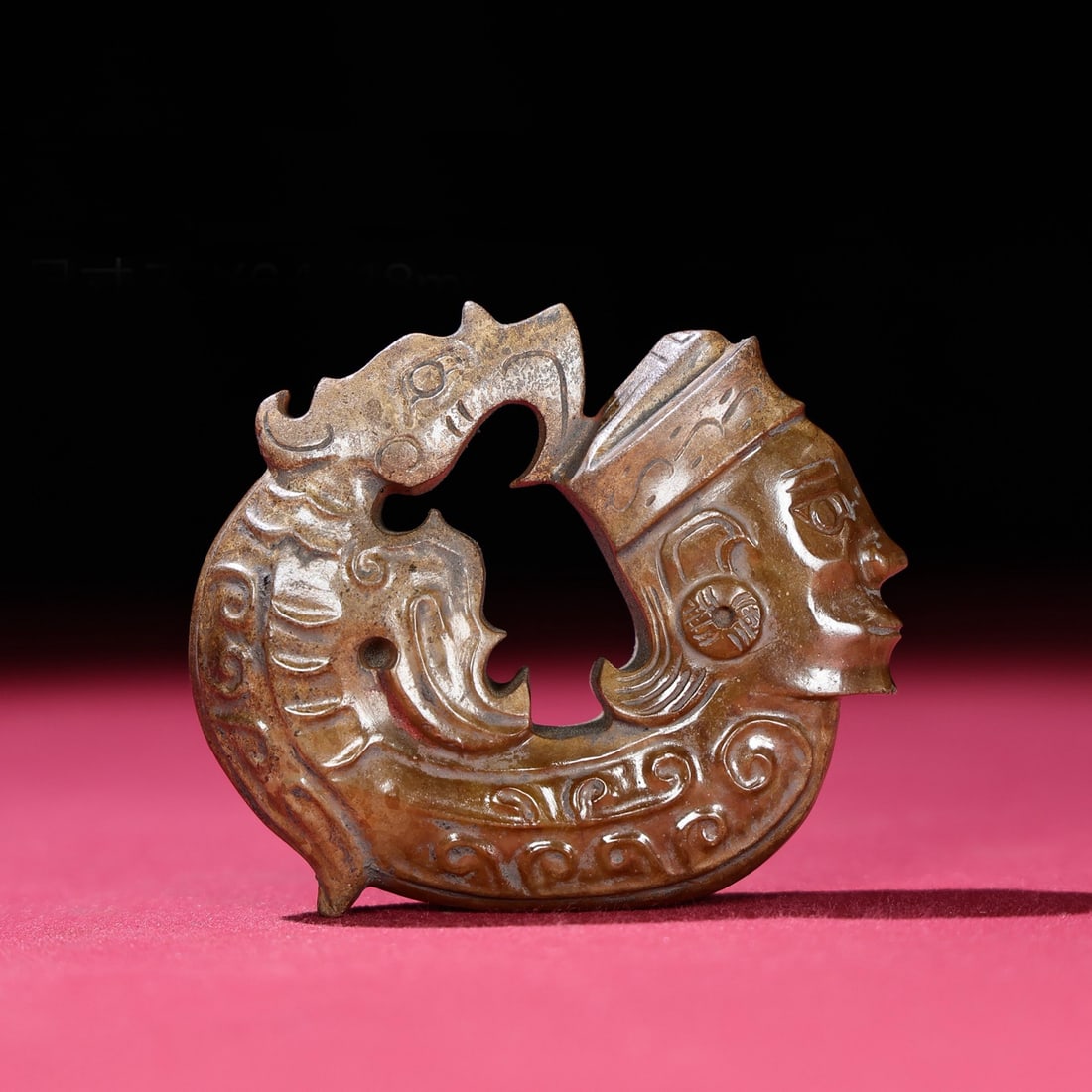 A Chinese Carved Jade Dragon and Man Statuette: A Chinese Carved Jade Dragon and Man Statuette. Lg. 7.3cm, Wd. 6.4cm, Th. 1.8cm, Wt. 121g