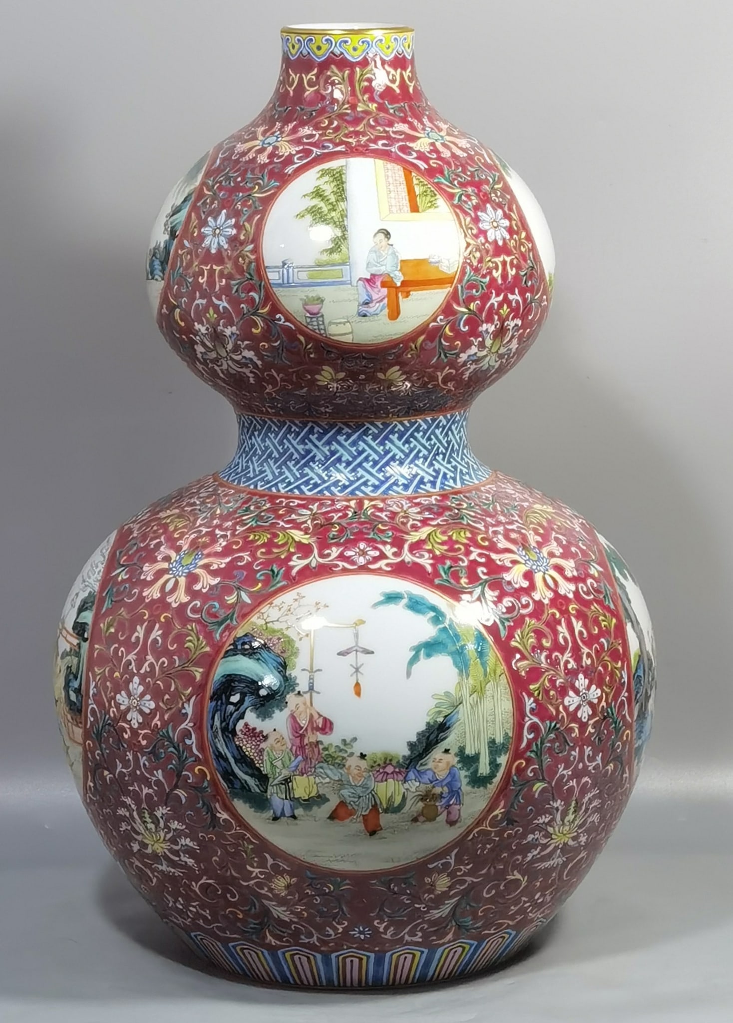 A Chinese Rouge-Red Ground Famille-Rose Porcelain Double Gourd Vase: A Chinese Rouge-Red Ground Famille-Rose Porcelain Double Gourd Vase. Ht. 45cm, Diam. 30cm