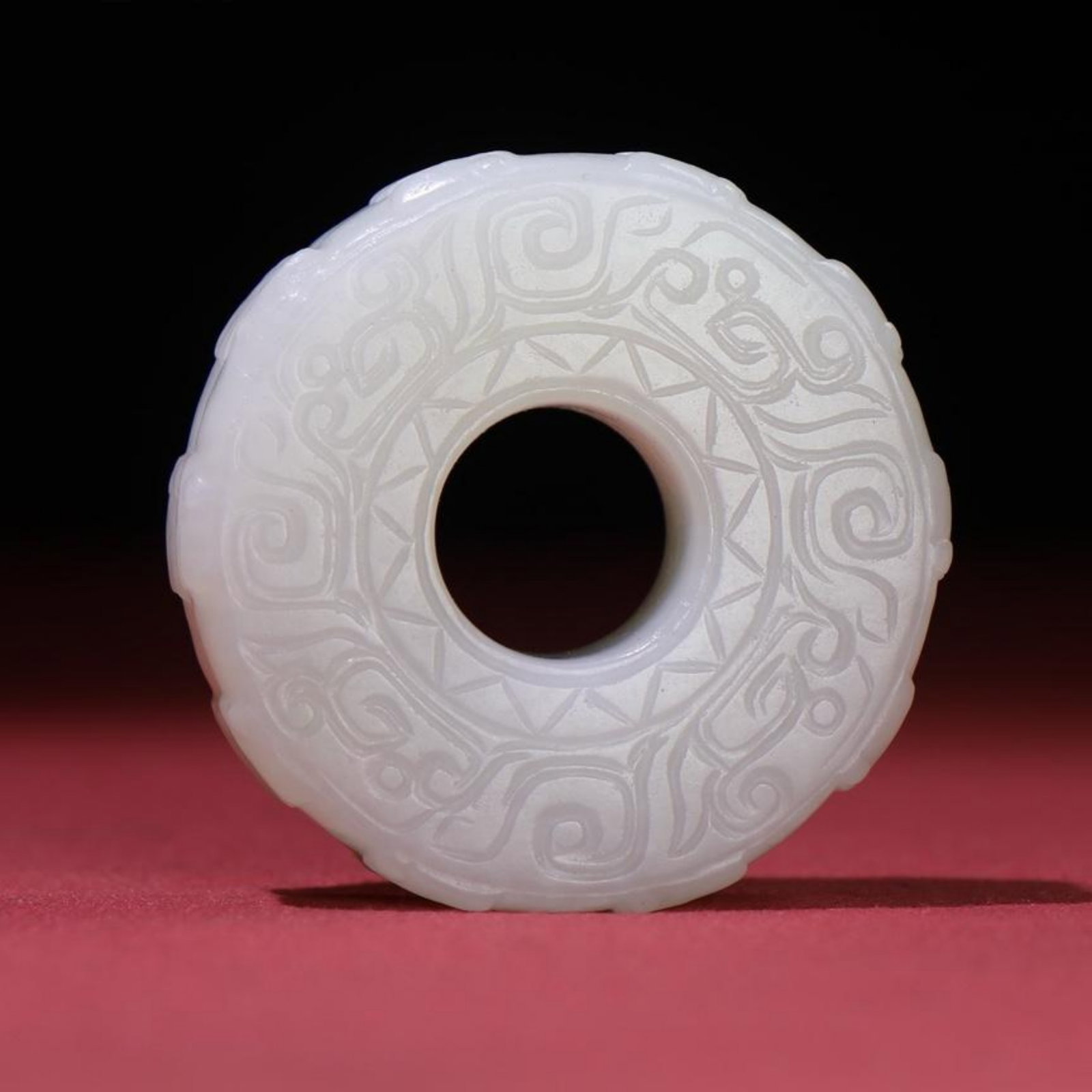 A Chinese Carved Jade Dragon Ring Pendant: A Chinese Carved Jade Dragon Ring Pendant. Diam. 5cm, Th. 1.5cm, Wt. 79g