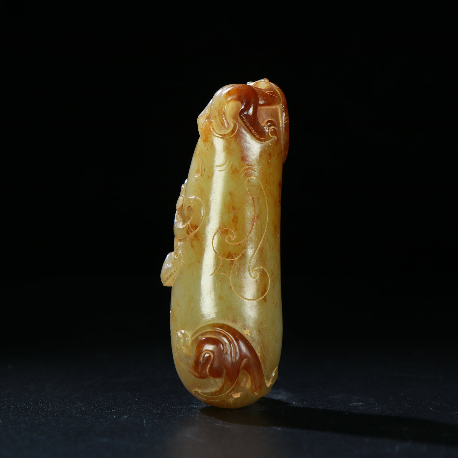 A Chinese Carved Jade Dragon Bead: A Chinese Carved Jade Dragon Bead. Ht. 7cm, Wd. 2.5cm, Wt. 54g