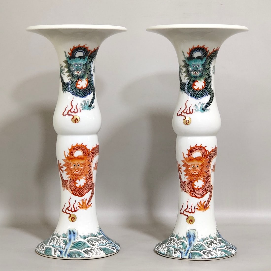 A Pair of Chinese Famille-Rose Porcelain Vases: A Pair of Chinese Famille-Rose Porcelain Vases. Ht. 25.5cm, Diam. 11.5cm
