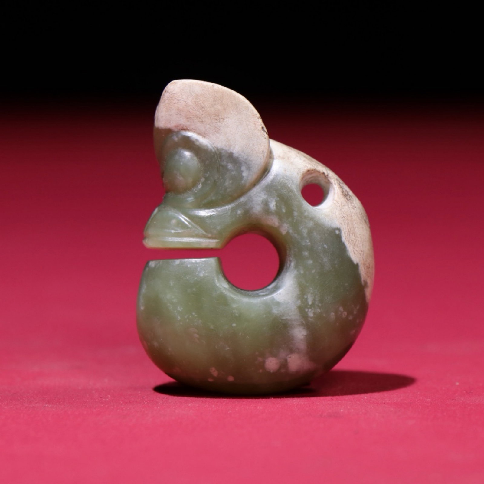 A Chinese Carved Jade Dragon Pendant: A Chinese Carved Jade Dragon Pendant. Ht. 4.8cm, Wd. 3.7cm, Th. 1.8cm, Wt. 51g
