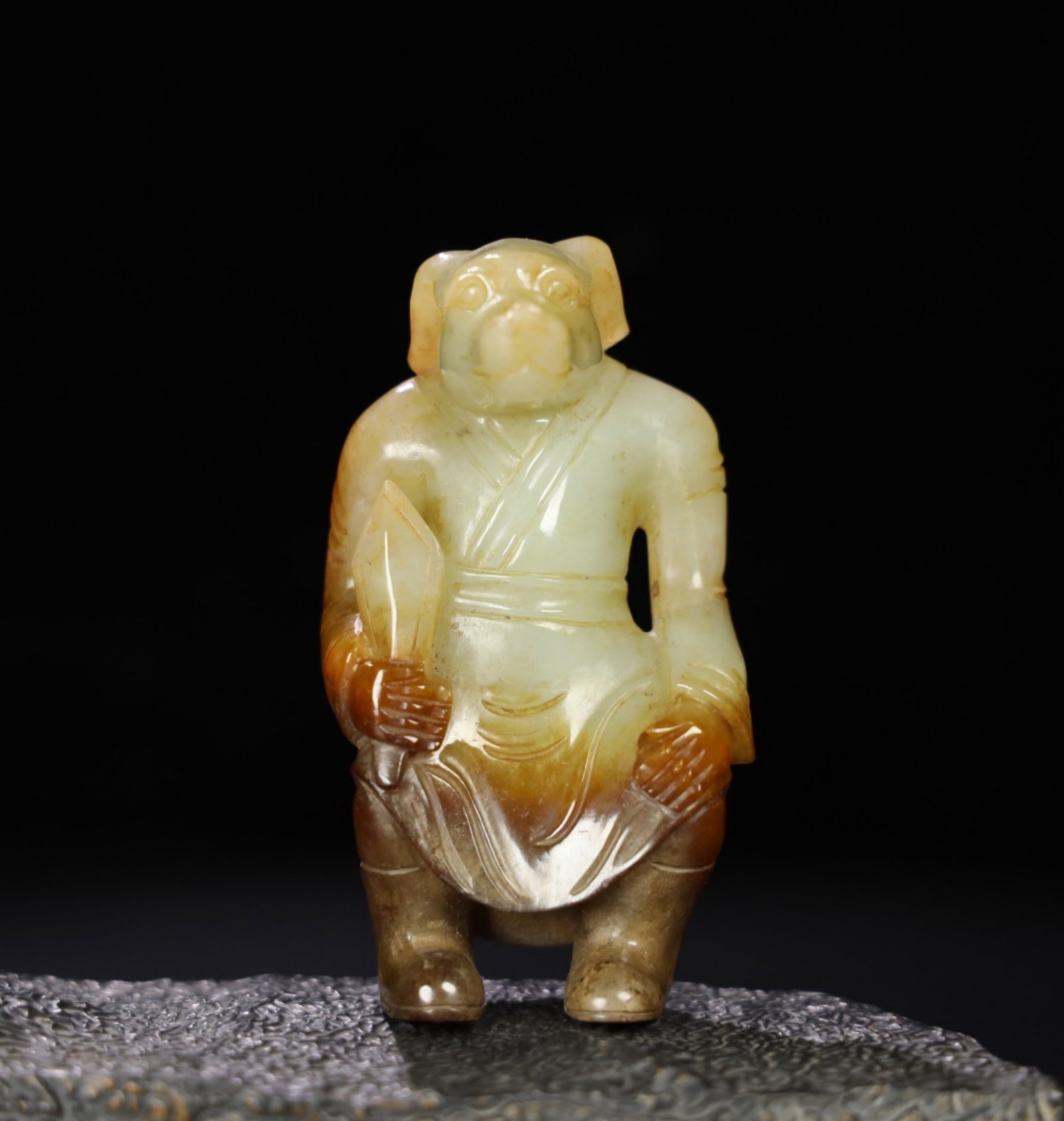 A Chinese Carved Jade Foo-Dog Statuette: A Chinese Carved Jade Foo-Dog Statuette. Lg. 5.1cm, Wd. 4.4cm, Ht. 9.5cm, Wt. 180.6g