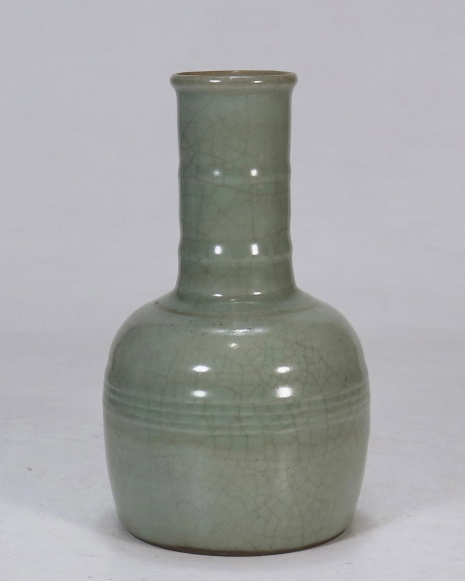 A Chinese Guan-Type Celadon Glazed Porcelain Vase: A Chinese Guan-Type Celadon Glazed Porcelain Vase. Ht. 18.8cm, Diam. 5cm