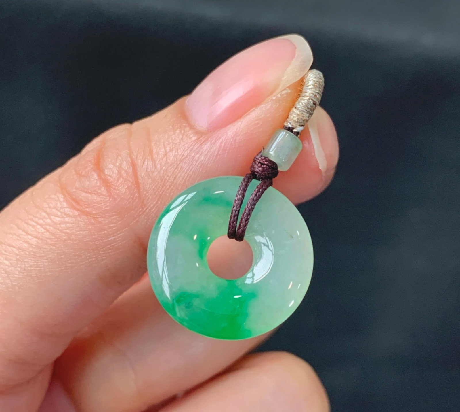 A Chinese Carved Jadeite Ring Pendant (1 of 4)