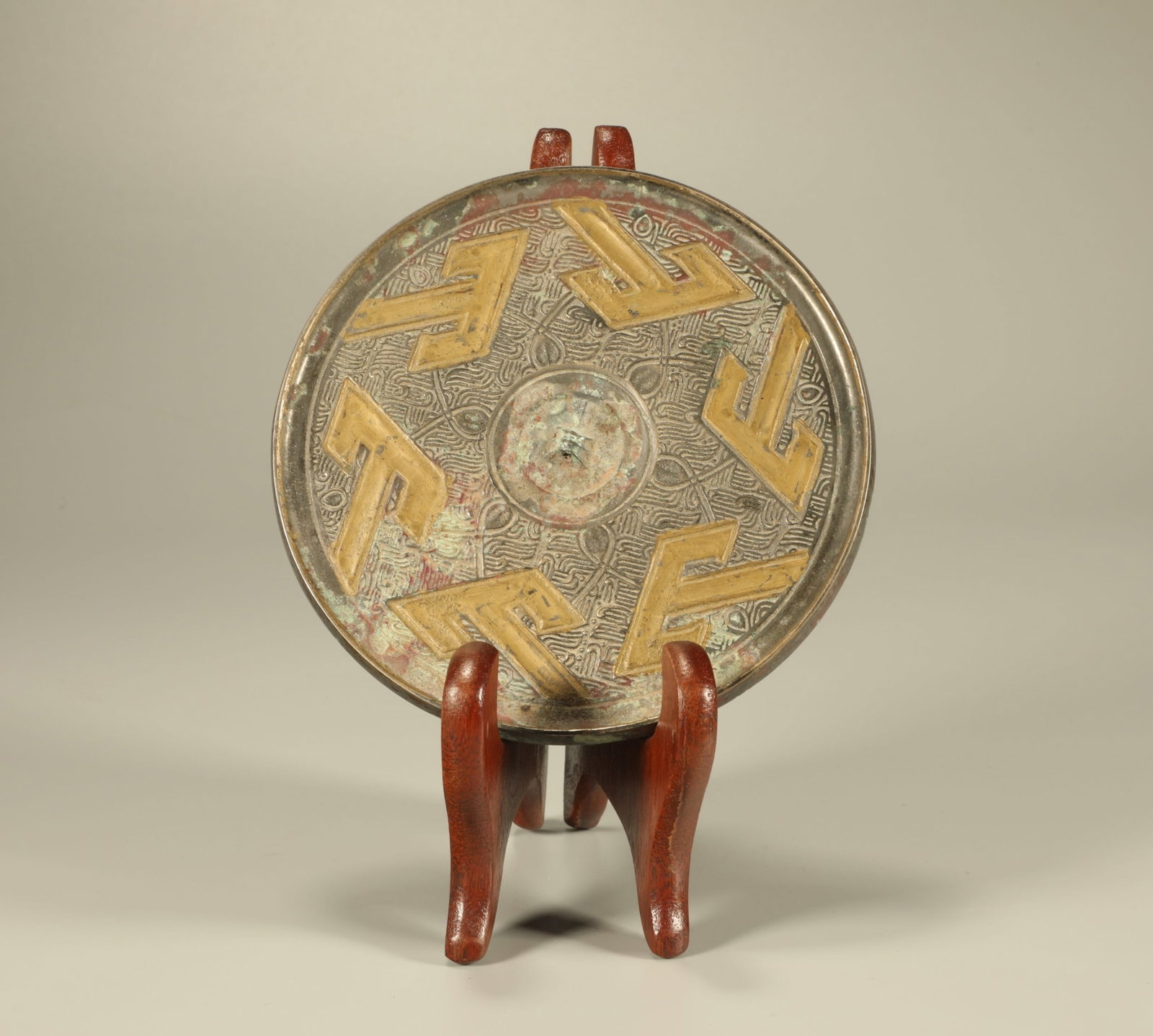 A Chinese Gilt Bronze Mirror (1 of 5)