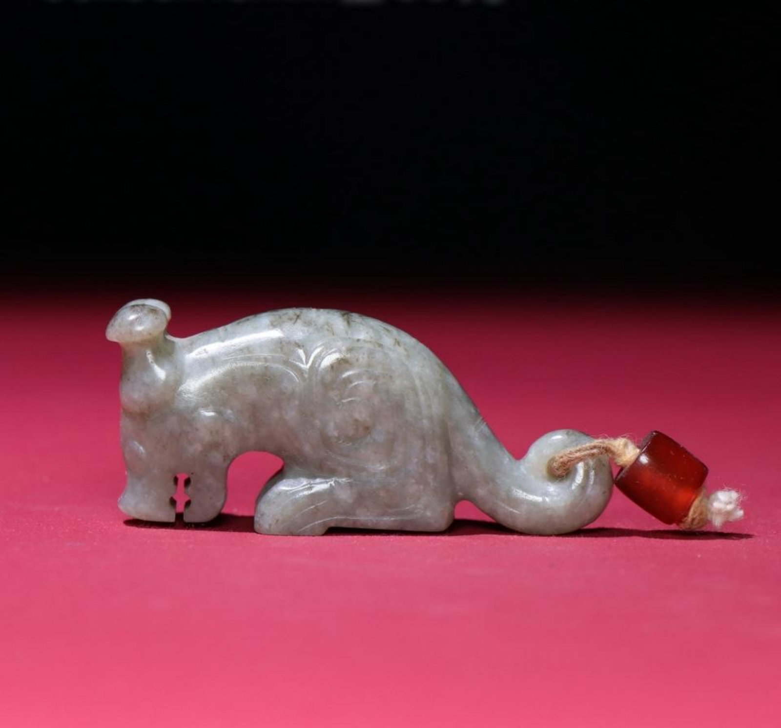 A Chinese Carved Jade Dragon Statuette: A Chinese Carved Jade Dragon Statuette. Lg. 6.6cm, Wd. 3cm, Th. 1.8cm, Wt. 56g