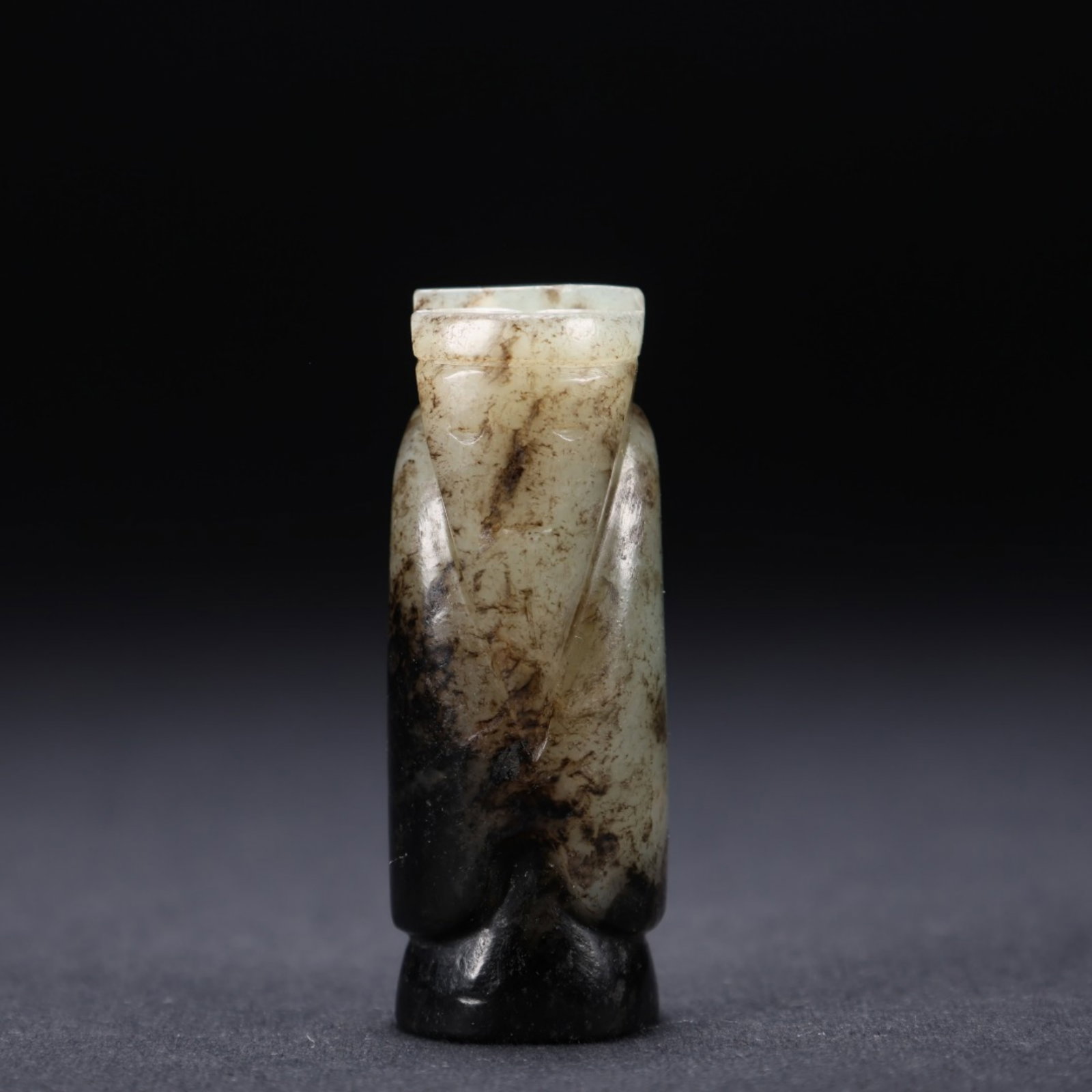 A Chinese Carved Jade Figure of Man: A Chinese Carved Jade Figure of Man. Lg. 1.5cm, Wd. 1.3cm, Ht. 4.1cm, Wt. 19g