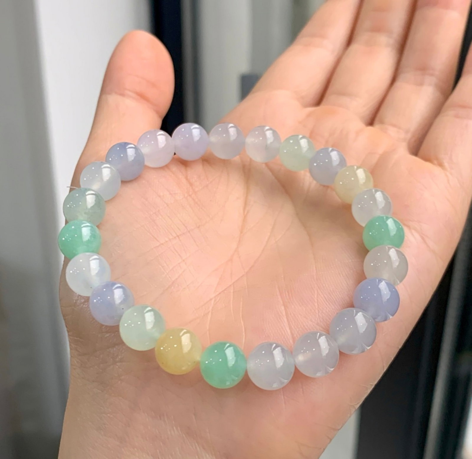 A Chinese Carved Jadeite Bracelet: A Chinese Carved Jadeite Bracelet. Diam. 0.8cm