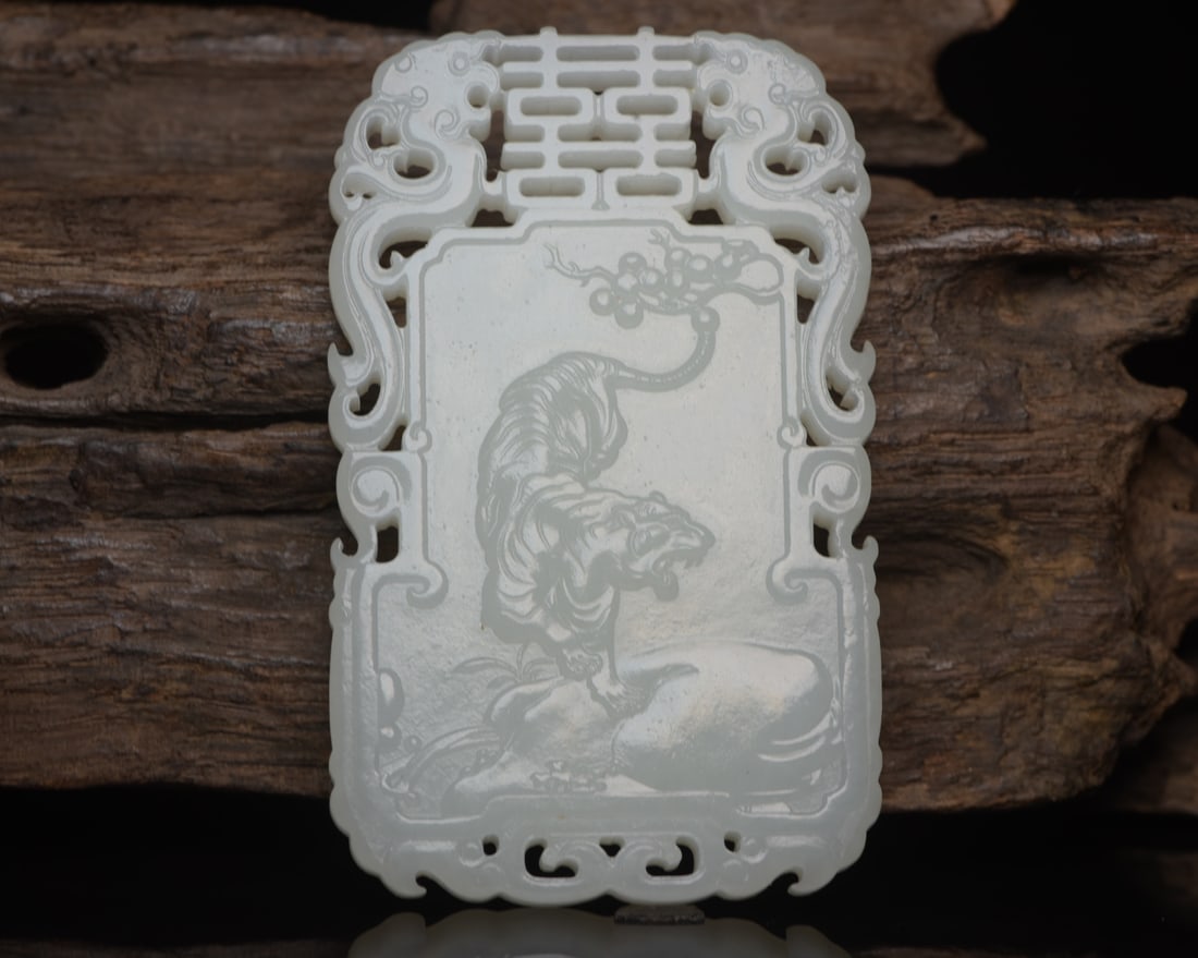 A Chinese Carved Jade Tiger Pendant: A Chinese Carved Jade Tiger Pendant. Ht. 8cm, Wd. 5cm, Th. 0.7cm, Wt. 70g