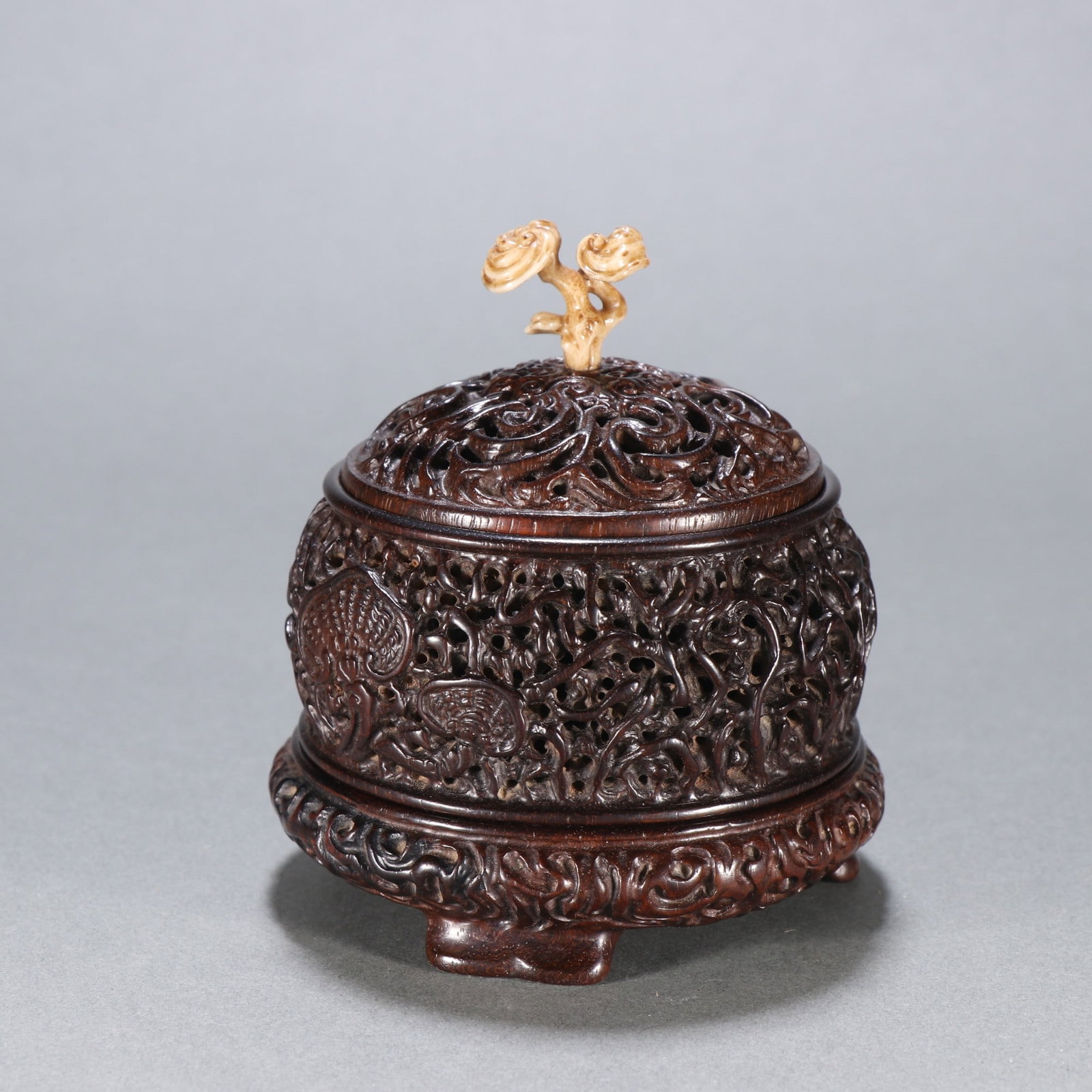A Chinese Carved Hardwood Incense Burner: A Chinese Carved Hardwood Incense Burner. Ht. 9cm, Wd. 8.2cm, Wt. 100g