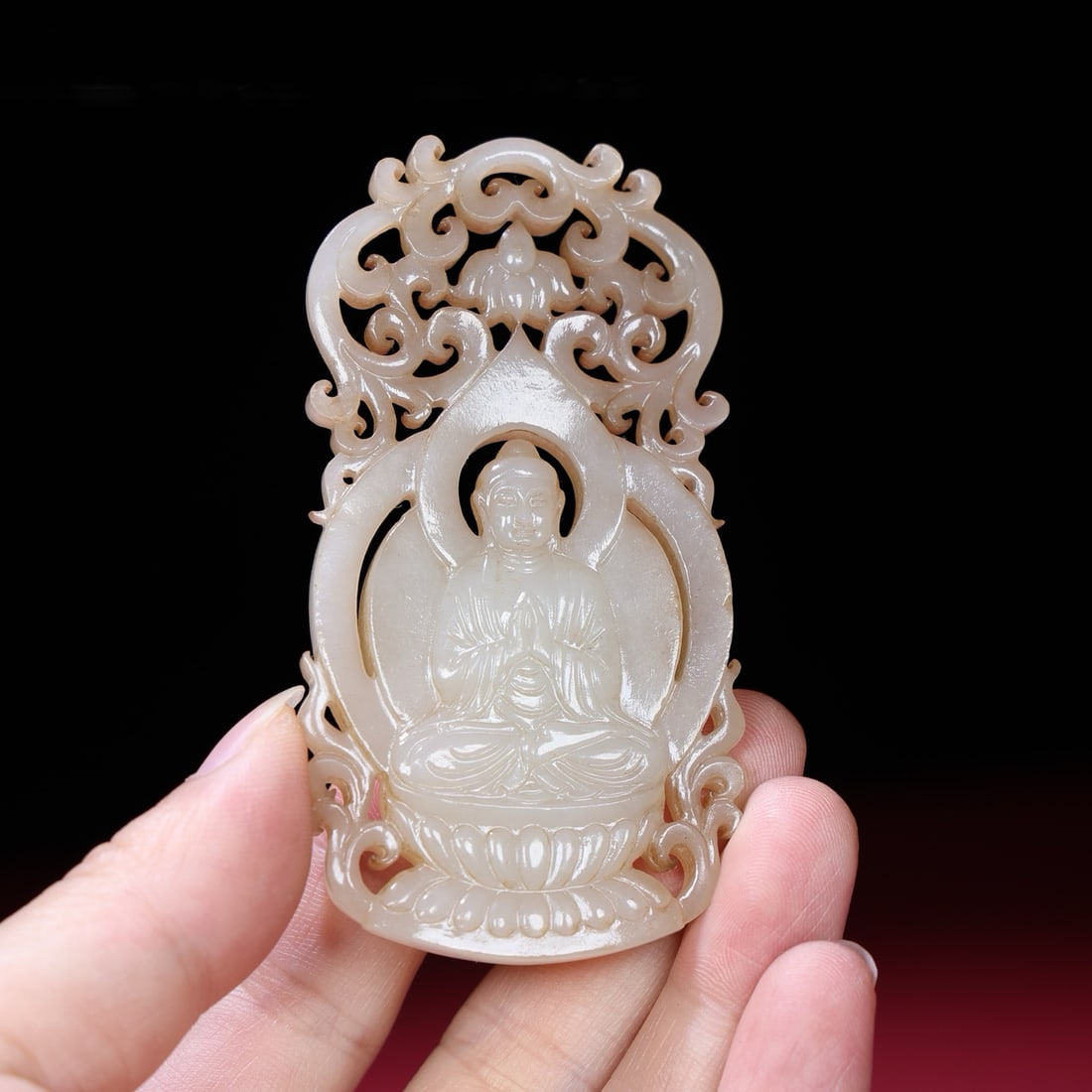 A Chinese Carved Jade Figure of Buddha Pendant: A Chinese Carved Jade Figure of Buddha Pendant. Ht. 4.3cm, Wd. 8.4cm, Th. 0.7cm, Wt. 40g