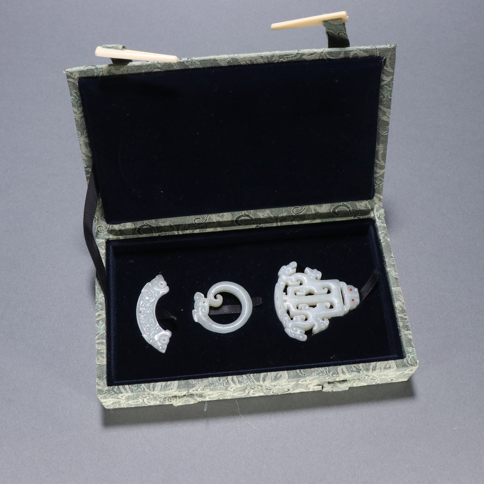 A Set of Chinese Carved Jade Pendants (1 of 9)