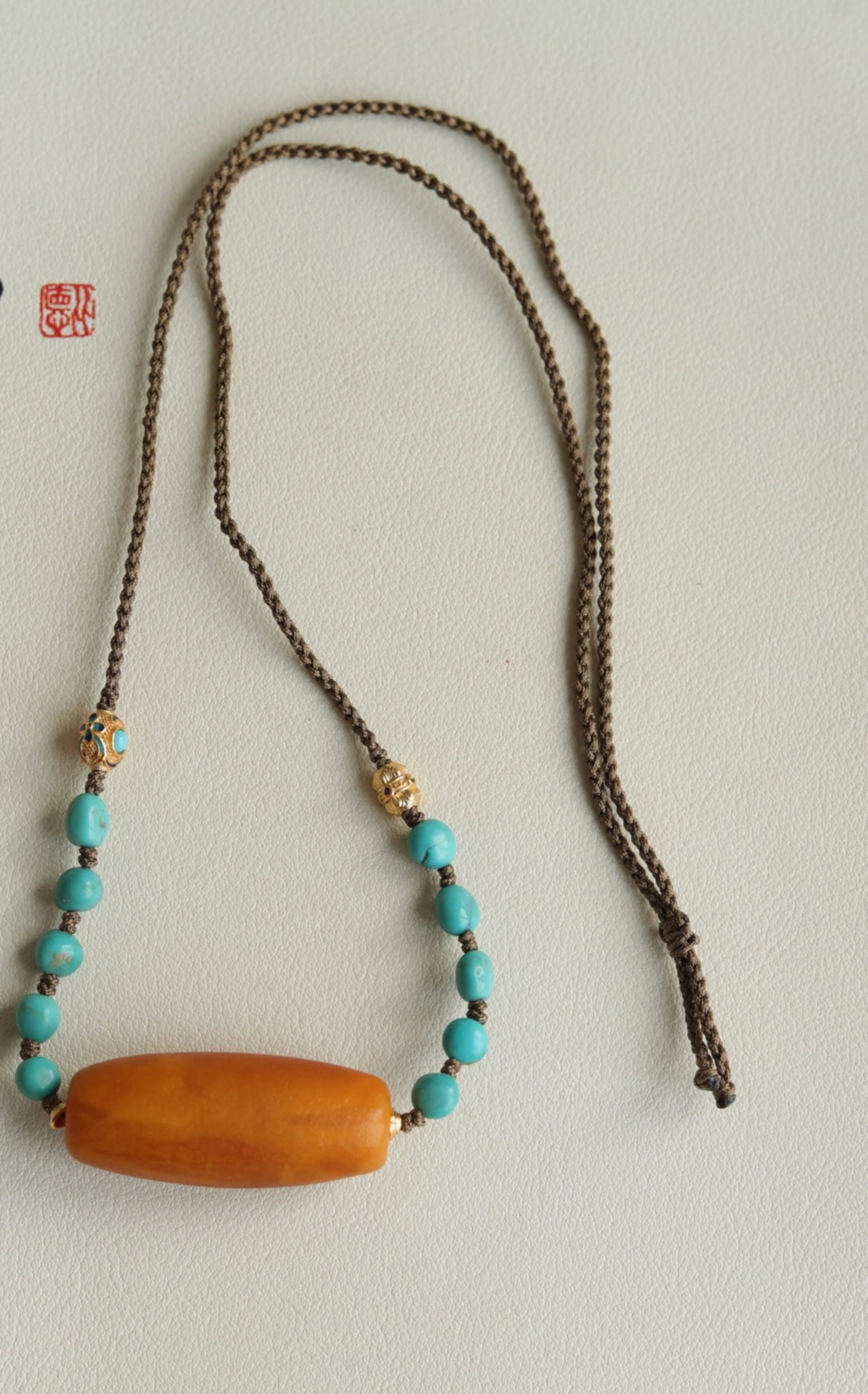 A Chinese Carved Amber Bead Necklace  (1 of 9)