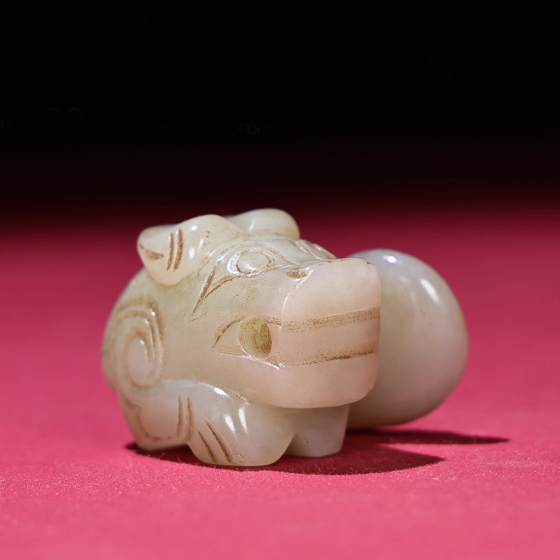 A Chinese Carved Jade Dragon Statuette: A Chinese Carved Jade Dragon Statuette. Lg. 4.3cm, Wd. 3.4cm, Th. 3cm, Wt. 60g