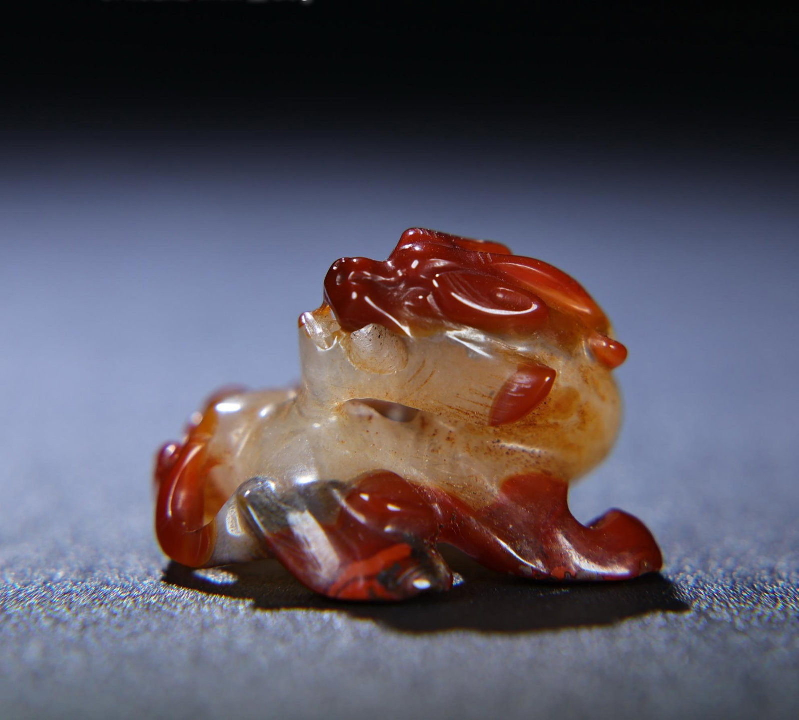 A Chinese Carved Red Jade Dragon Statuette (1 of 9)